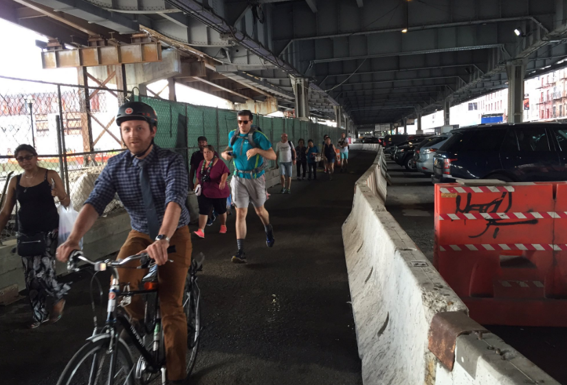 ...while the boardwalk was under construction, people walking and biking had to share this narrow path. Photo: Jon Orcutt