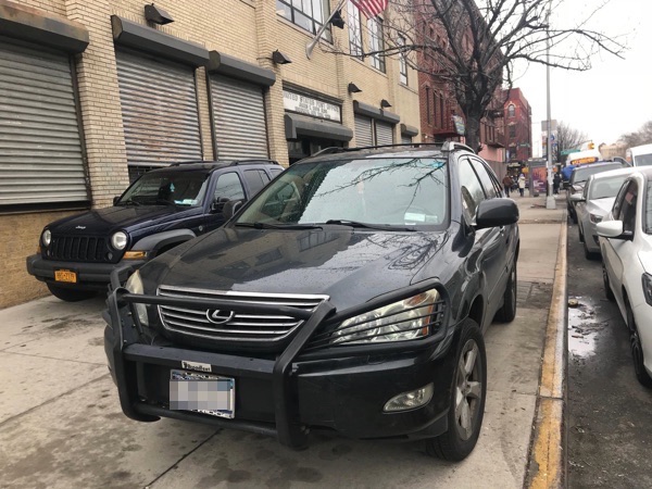 Postal Service Street Cheats Double Park Personal Cars on Empire Boulevard Sidewalk