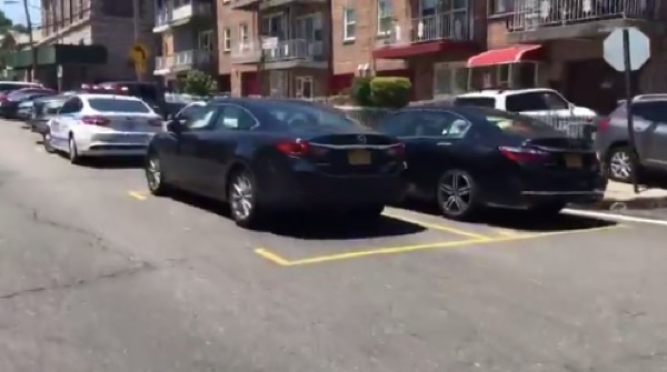 NYPD Street Cheats Paint Their Own Double-Parking Spaces Outside the 110th Precinct