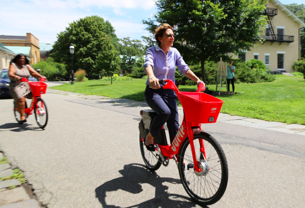 DOT Commissioner Polly Trottenberg on a Jump bike last year. Photo: DOT