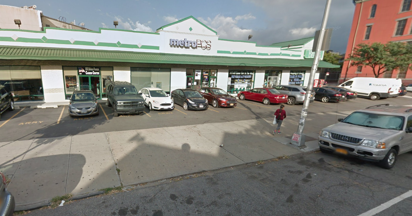 The parking lot at 491 Knickerbocker Avenue is required by the city's zoning rules, but drivers can only get there by crossing over the sidewalk -- the exact same condition that killed 4-year-old Luz Gonzalez in June. Photo: Google Maps