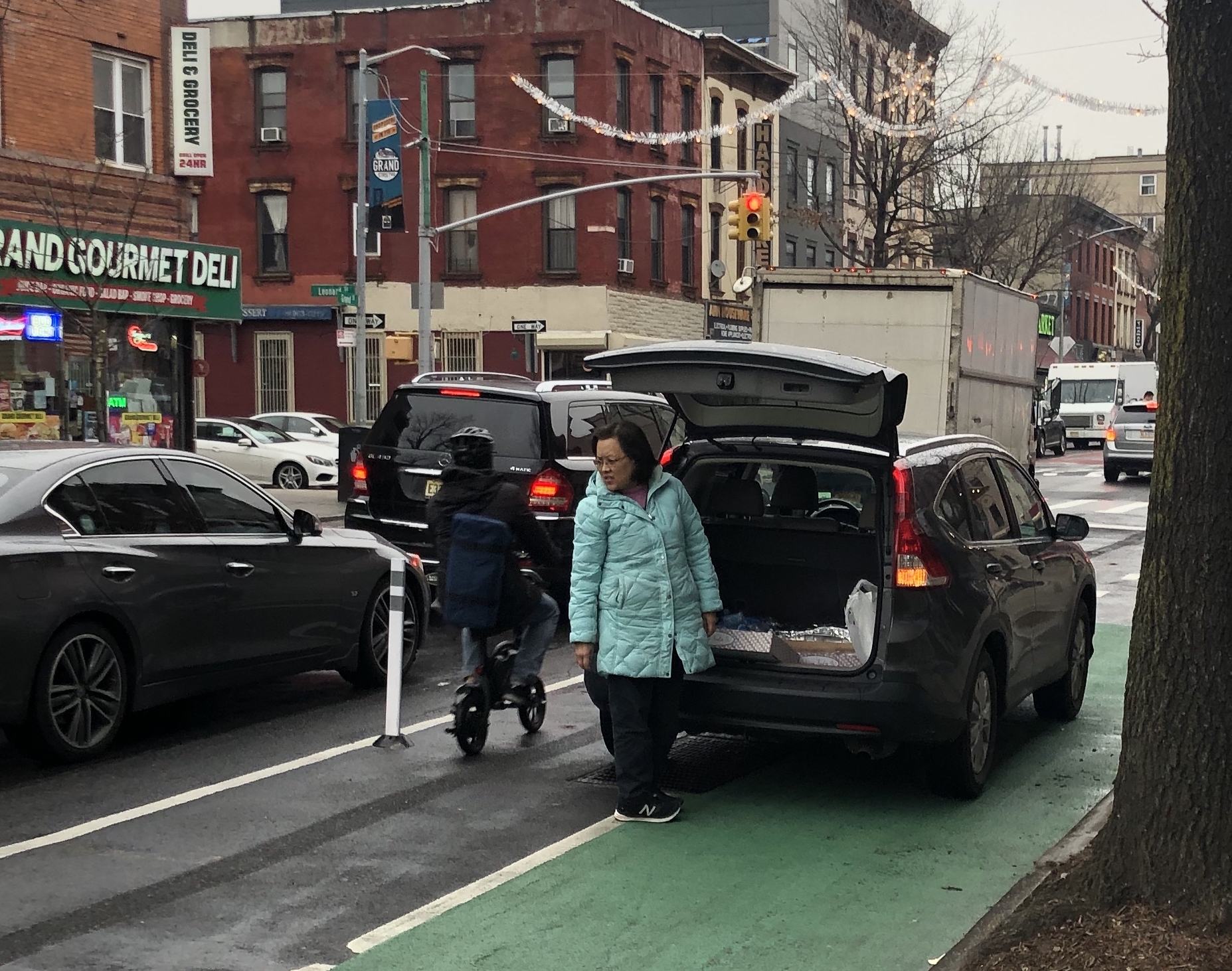 A bike lane that is not physically protected will often be blocked, as this one on Grand Street is. Photo: Philip Leff