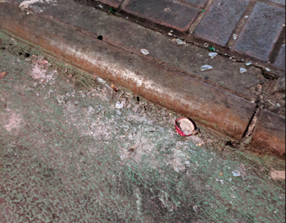 Cyclist Jonathan Warner spotted broken glass in the 12th and 13th street bike lanes on Thursday. Photo: Jonathan Warner
