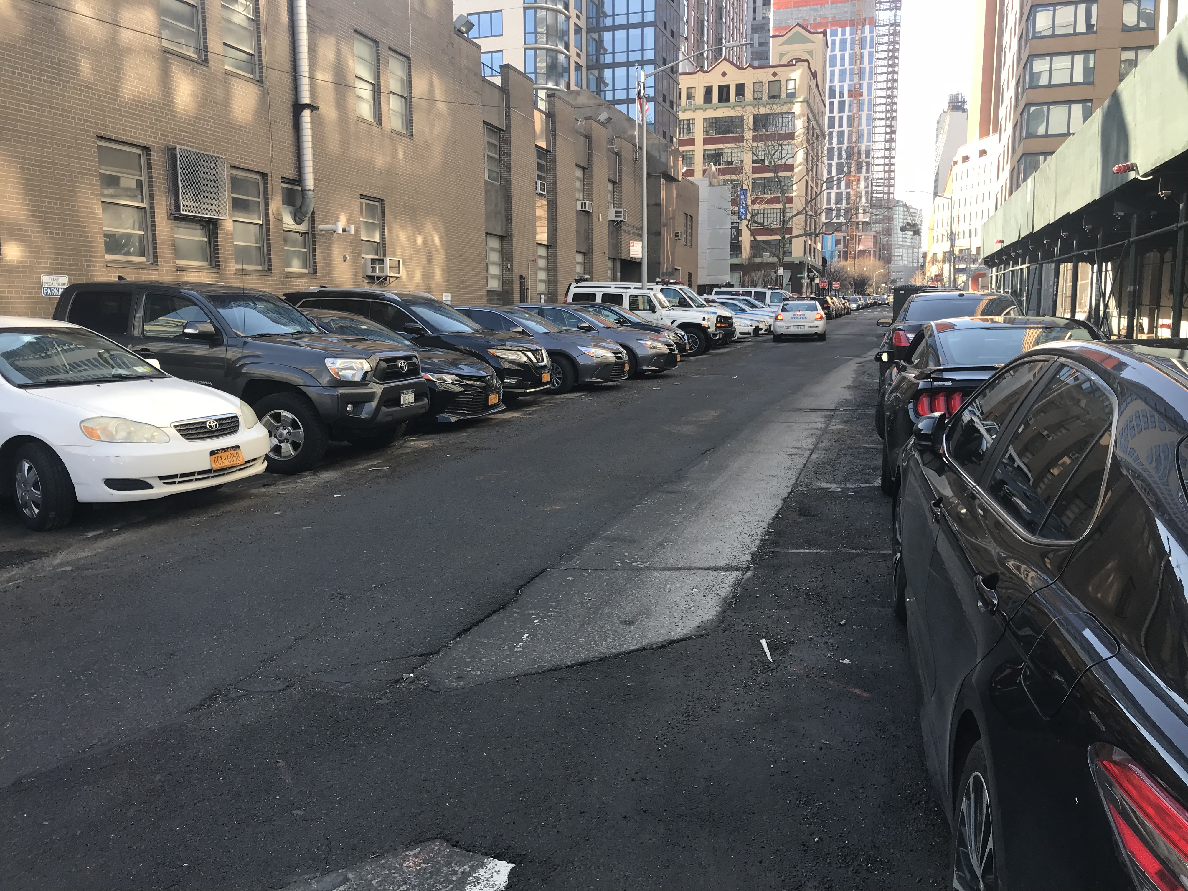 Most police station houses are ringed by legally and illegally parked private police officers' vehicles — many of which have been slapped with multiple tickets. Here's the scene at the 84th Precinct station house. Photo: Julianne Cuba