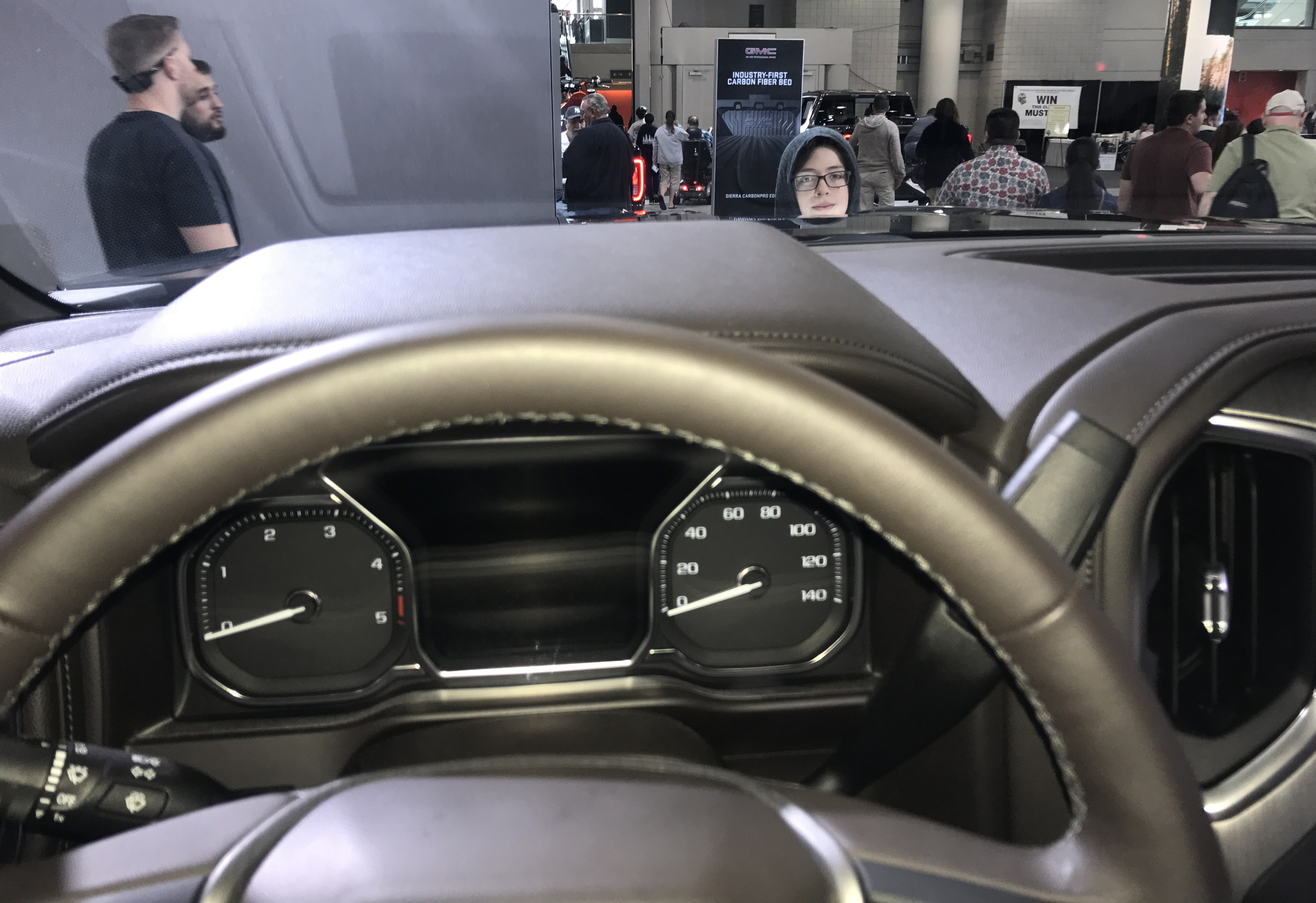 Here's how little of a kid you can see from the seat of a GMC Denali.