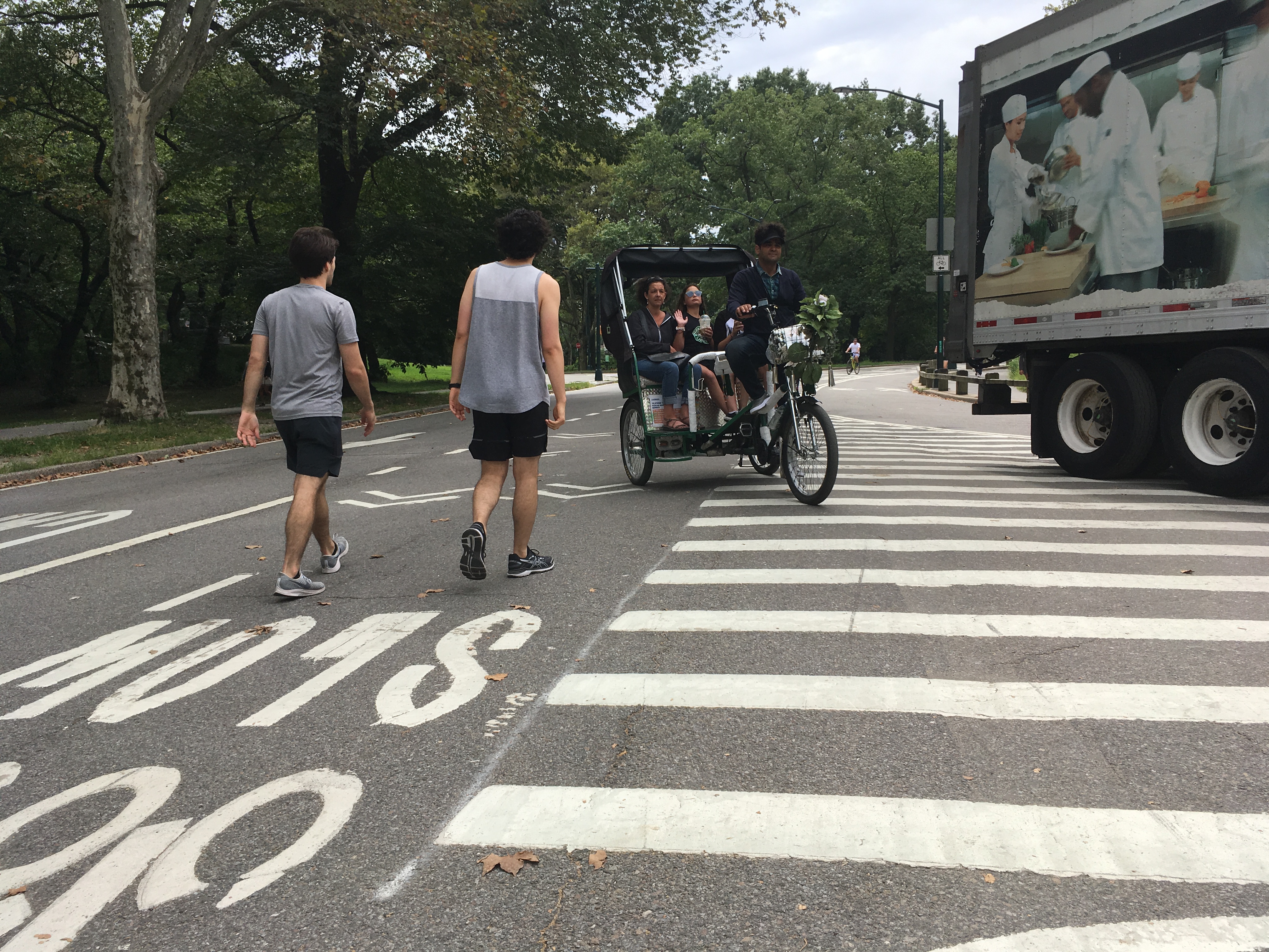 A pedicab trying to go west mixes it up with a tractor-trailer at the confluence of the Terrace and East drives. Photo: Eve Kessler