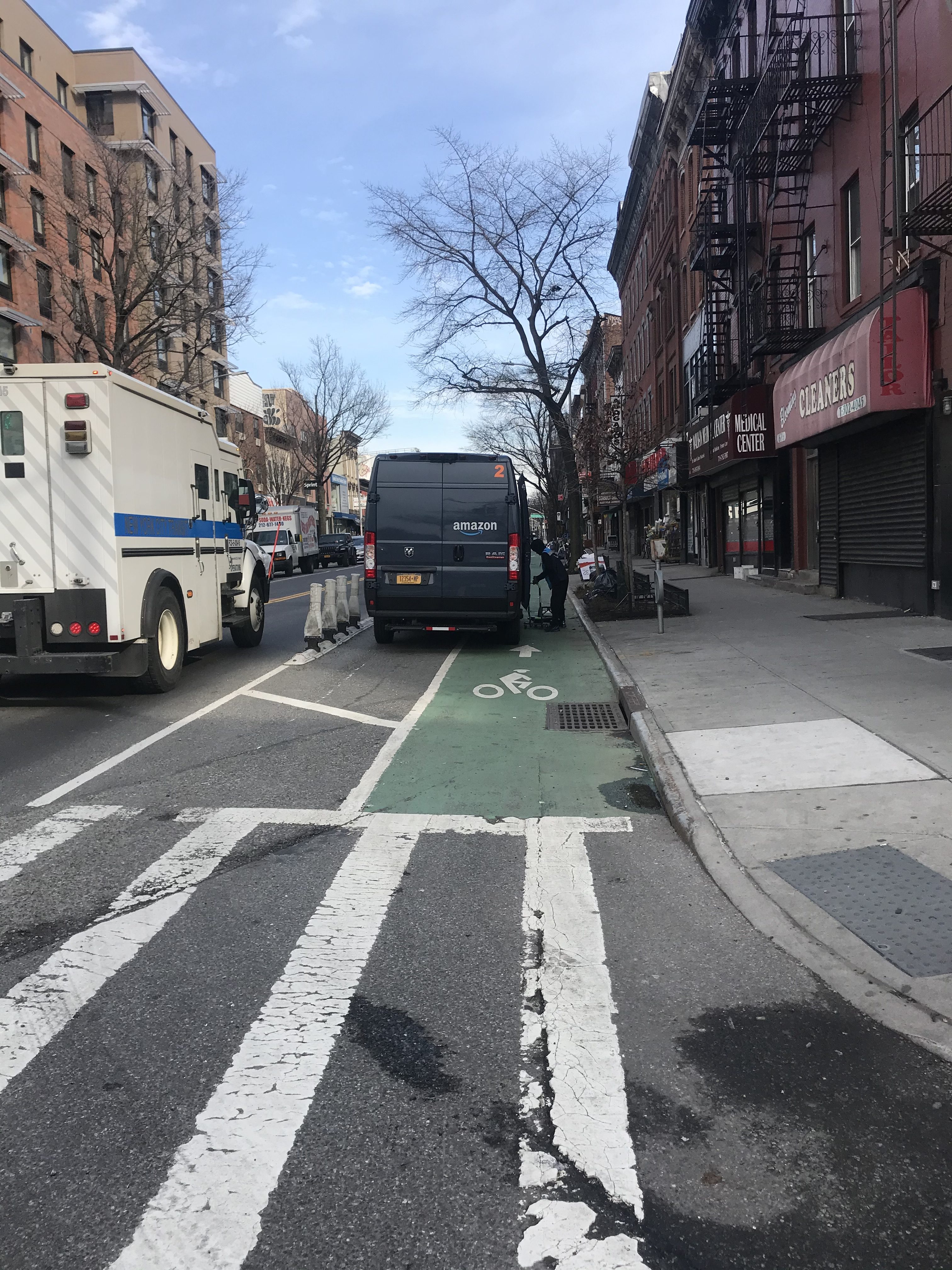 An Amazon truck taking up the whole width of the bike lane. Photo: Julianne Cuba