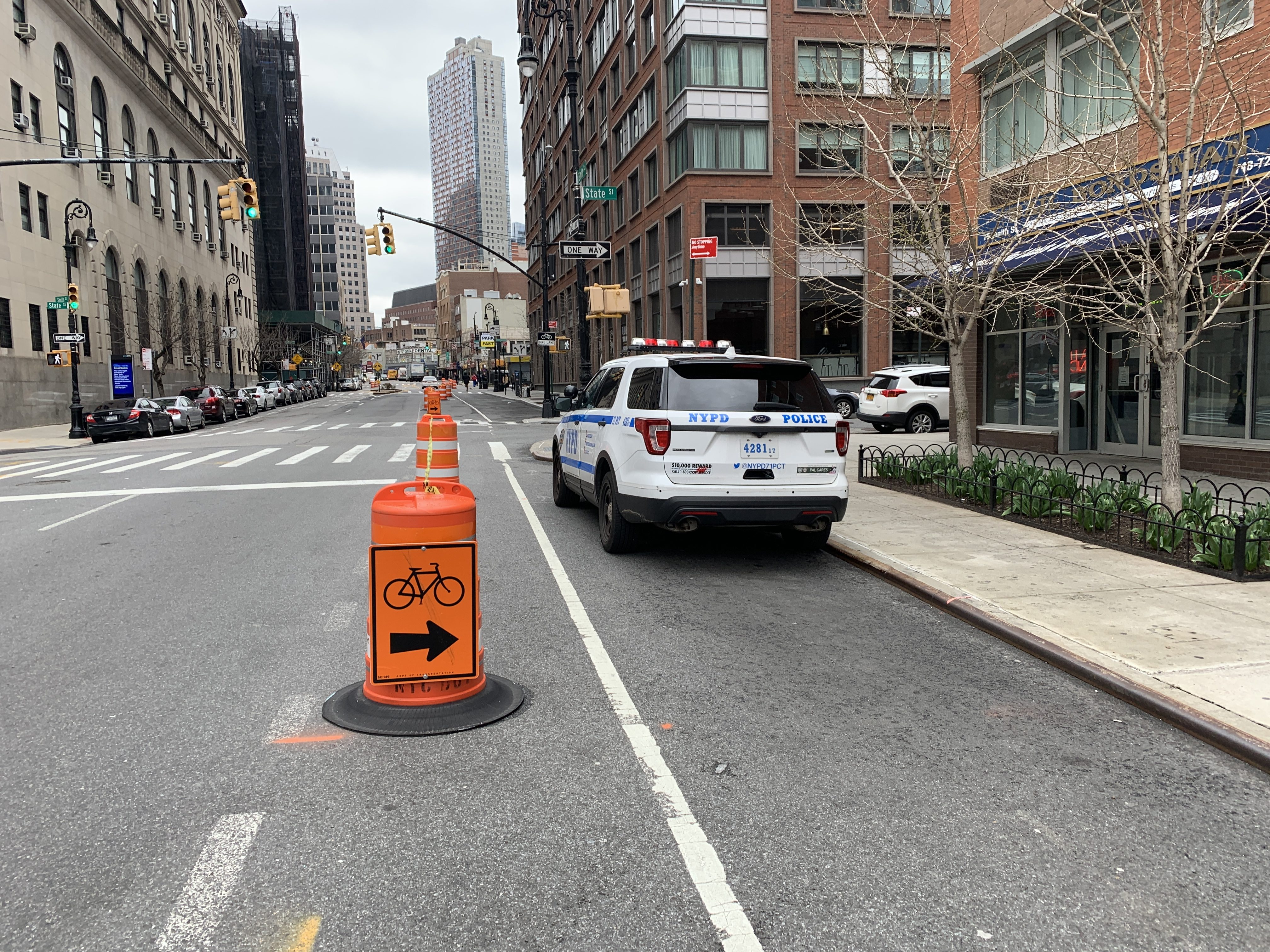 This is one of two squad cars that blocked the temporary protected bike lane on Smith Street on Monday.