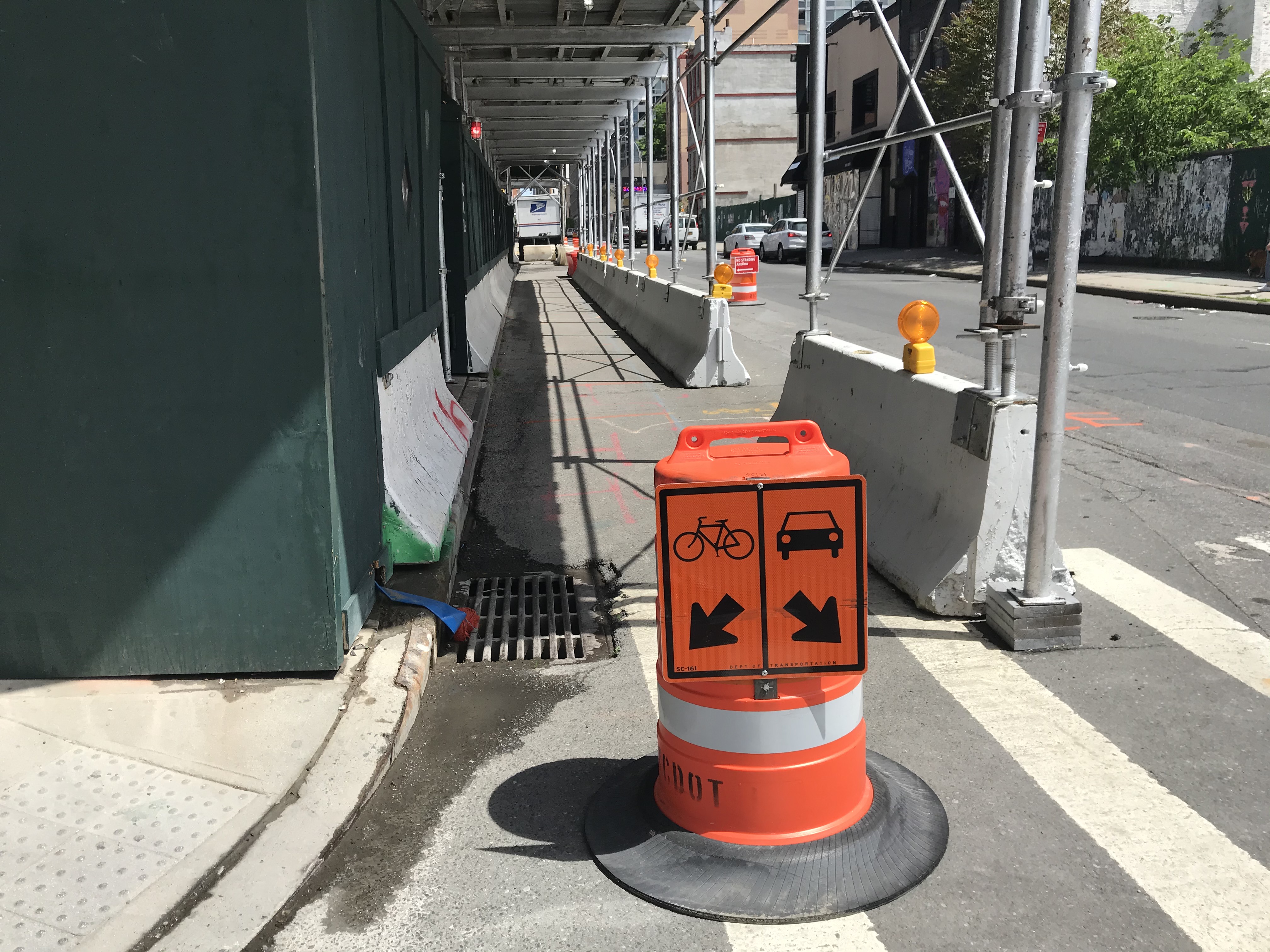 A barrel at the intersection of 38th Street and Tenth Avenue placed directly in the entrance to the street. Photo: Dave Colon