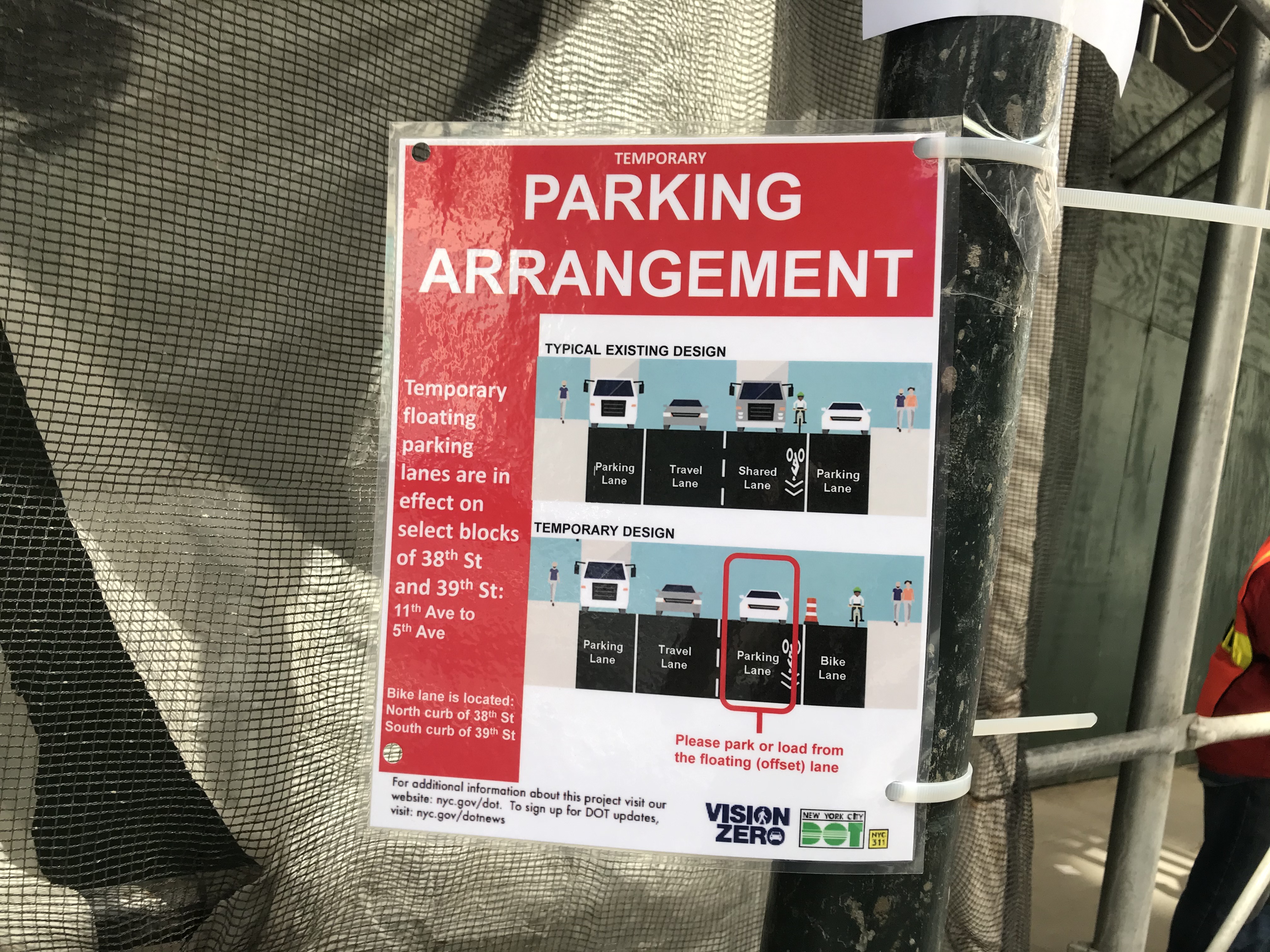 A sign announcing the bike lane starts at Fifth Avenue. Photo: Dave Colon