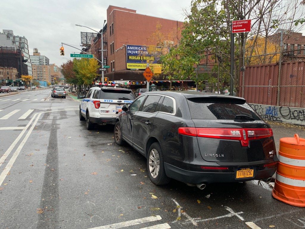Despite Many Calls to 311, Abandoned Car Sits and Sits and Sits in DOT Bike Lane