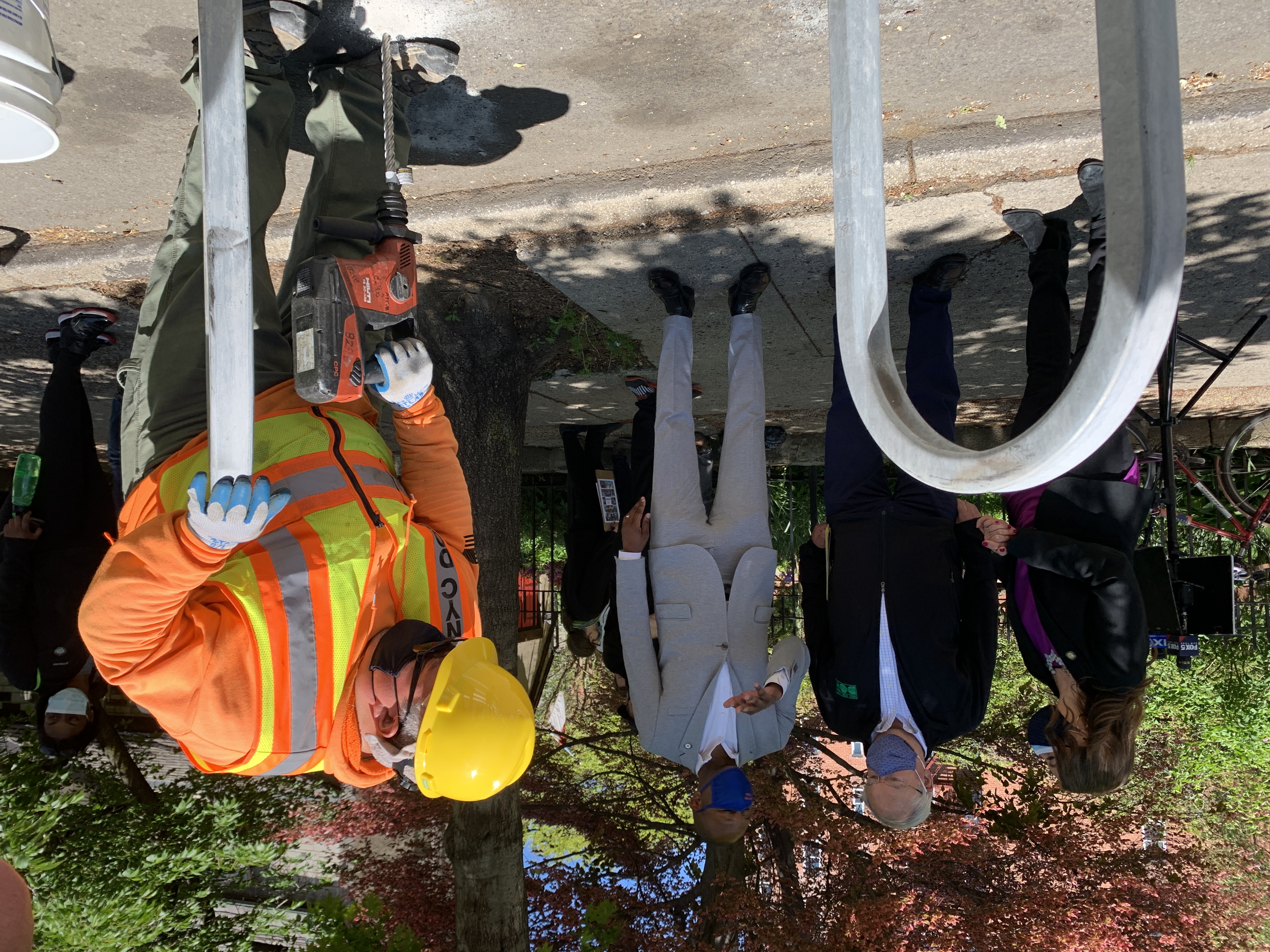 DOT Commissioner Hank Gutman on 34th Avenue on Wednesday, flanked by Assembly Member Jessica González-Rojas and Queens Borough President Donovan Richards. Photo: Gersh Kuntzman