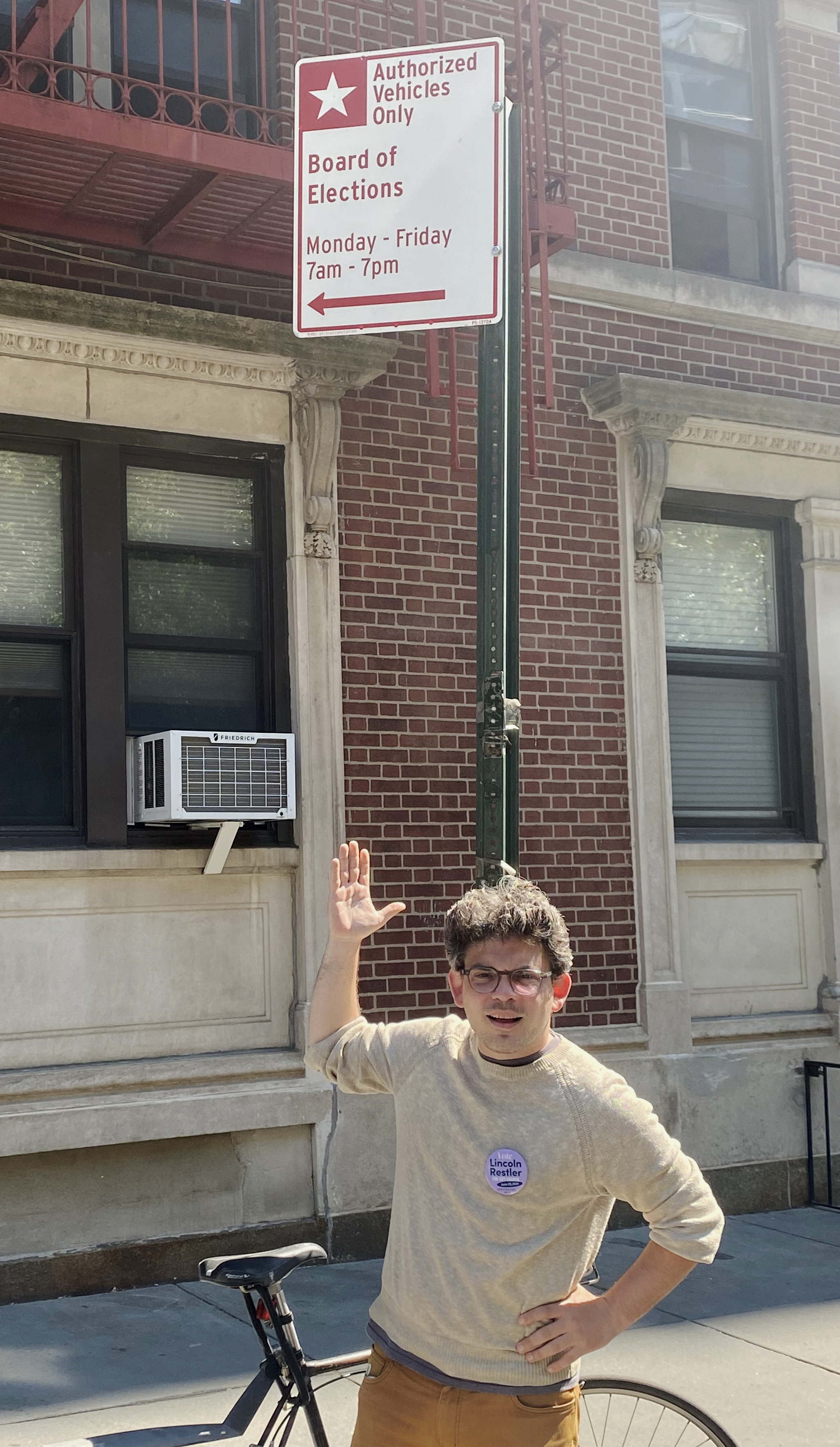 City Council candidate Lincoln Restler with the object of his disaffection.