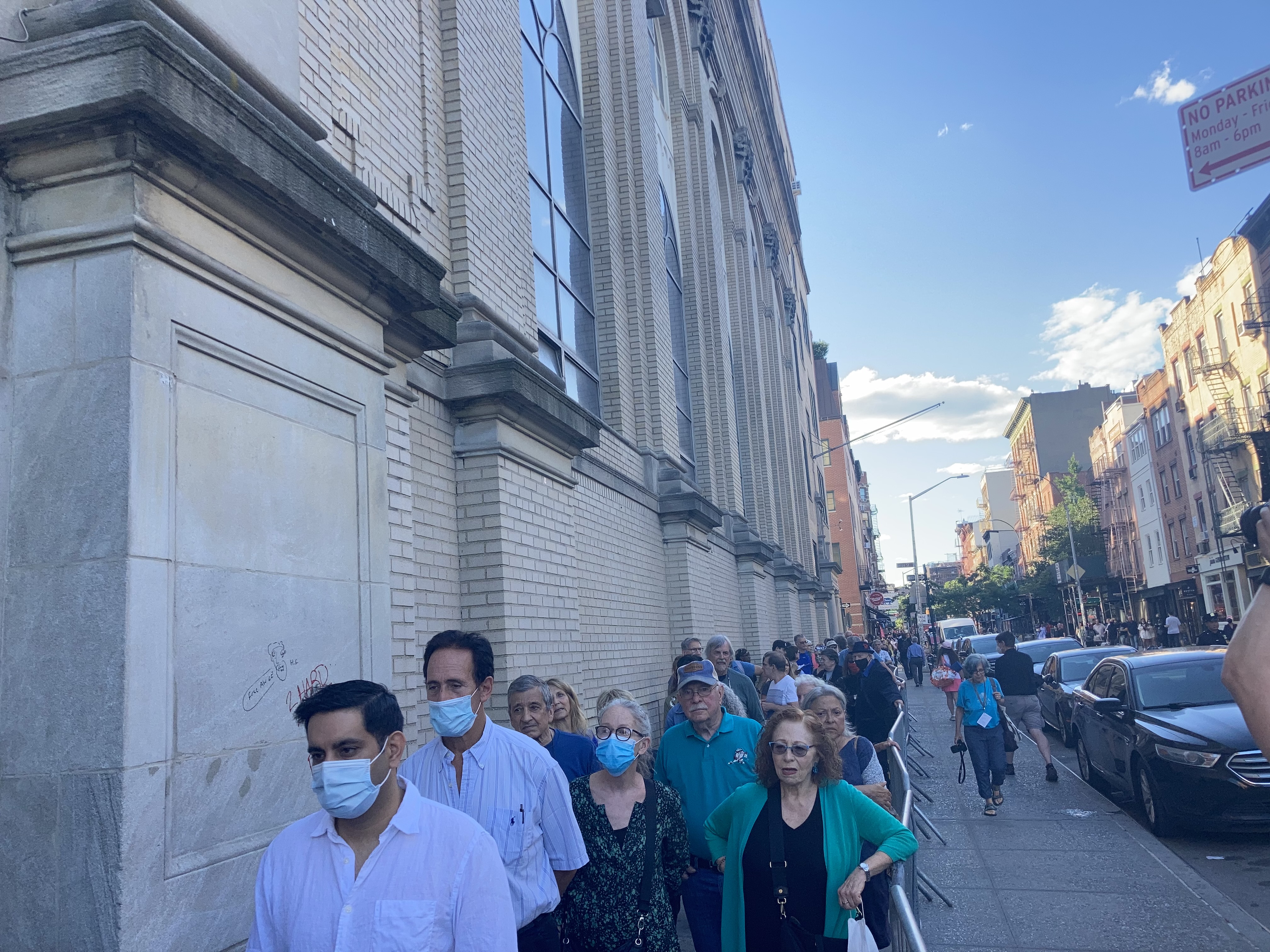 The line to get into the meeting. Photo: Julianne Cuba
