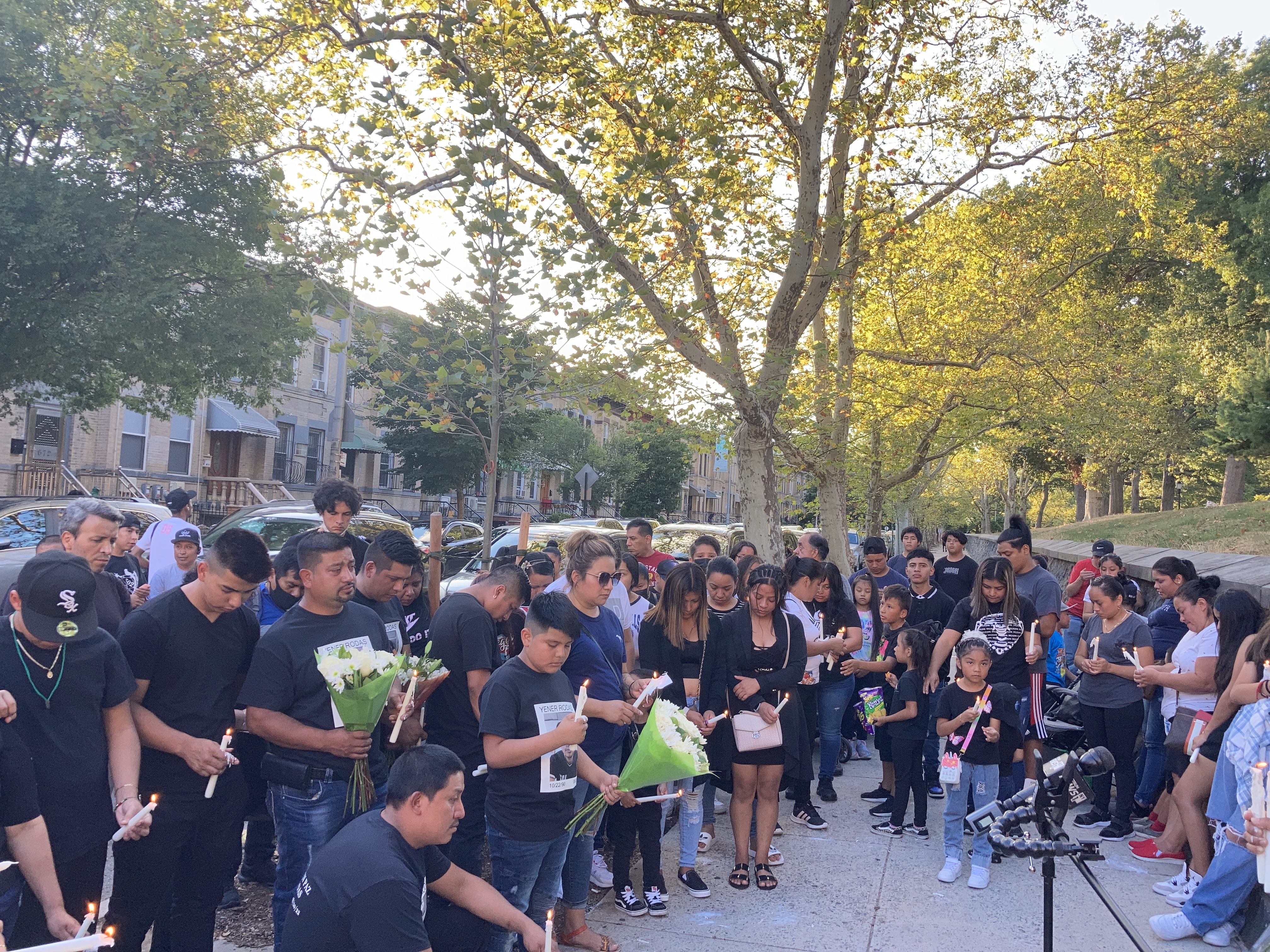 A candlelit vigil for Yener Rodas on Tuesday night in Sunset Park. Photo: Julianne Cuba