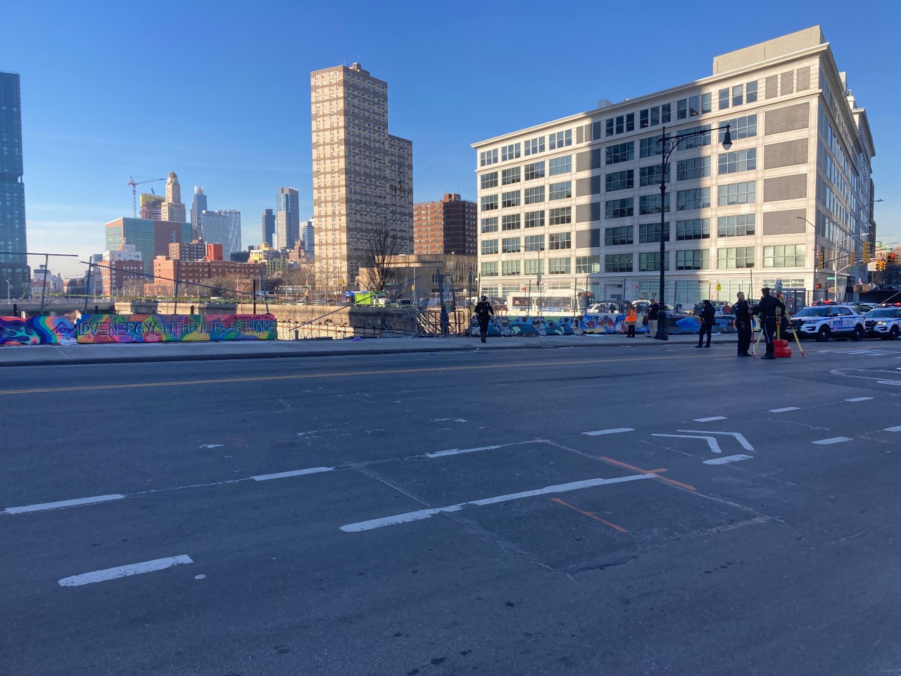 A chunk of the concrete barrier is missing, right where the SUV crashed into and where two women were walking by. Photo: Julianne Cuba
