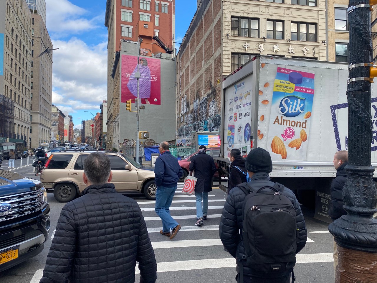 Pedestrians have to weave around traffic to cross Canal Street at Lafayette Street. Photo Kevin Duggan