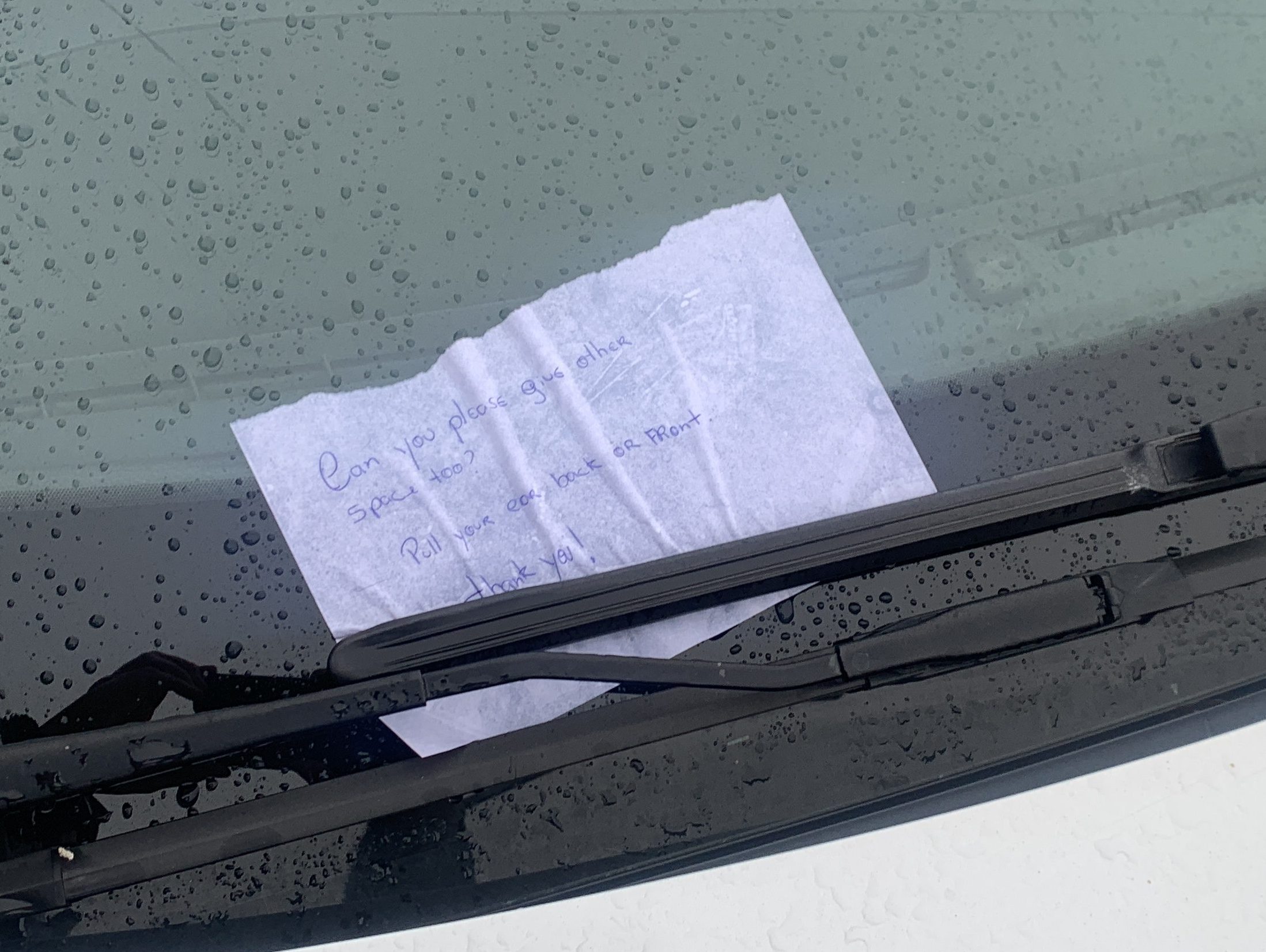 This note asks the driver to use all the space available — even though doing so makes the crosswalk less safe.