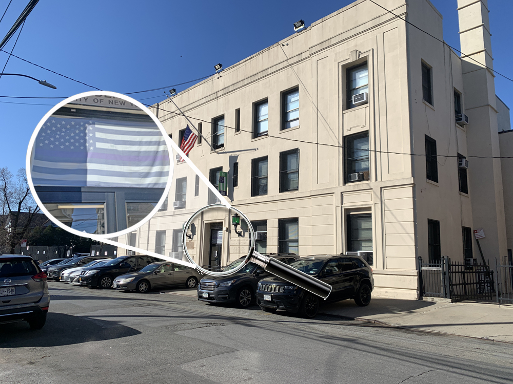 Really? The Thin Blue Line flag over the front entrance of the station house?