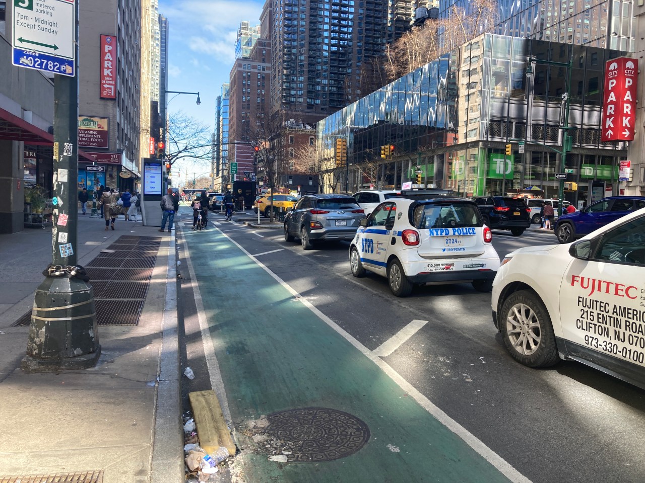 Good job? Officers are not parked in the bike lane.