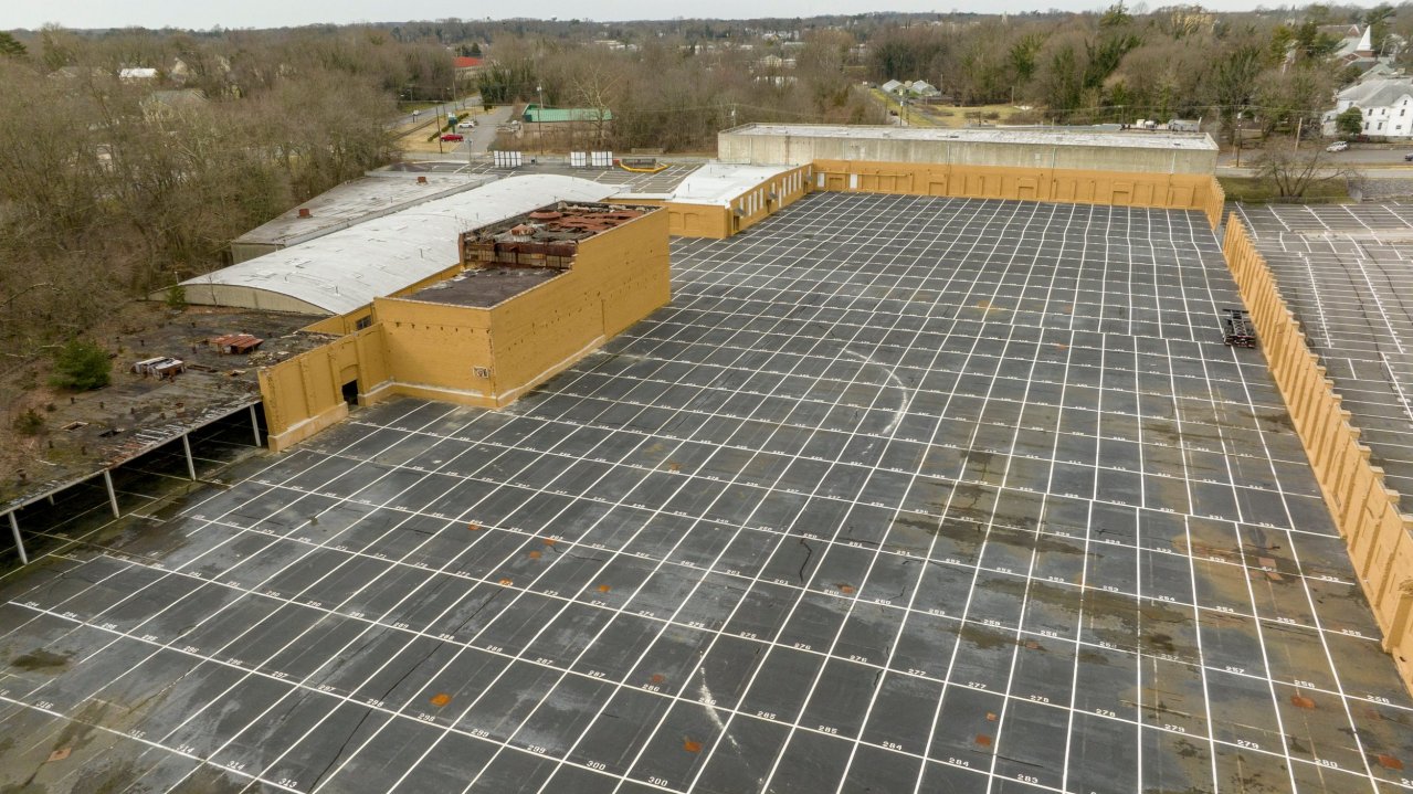 Used car dealers at this Bridgeton, N.J. compound issued 45,000 temporary license plates in 2022. Photo: Johnny Milano