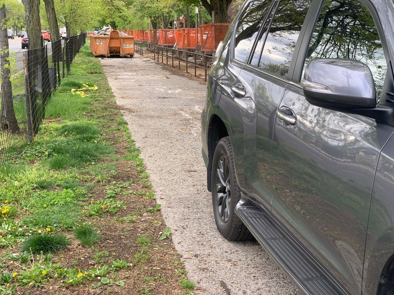 Workers had torn up the pedestrian side of the mall... and someone parked a car in the construction zone. Photo: Jon Orcutt