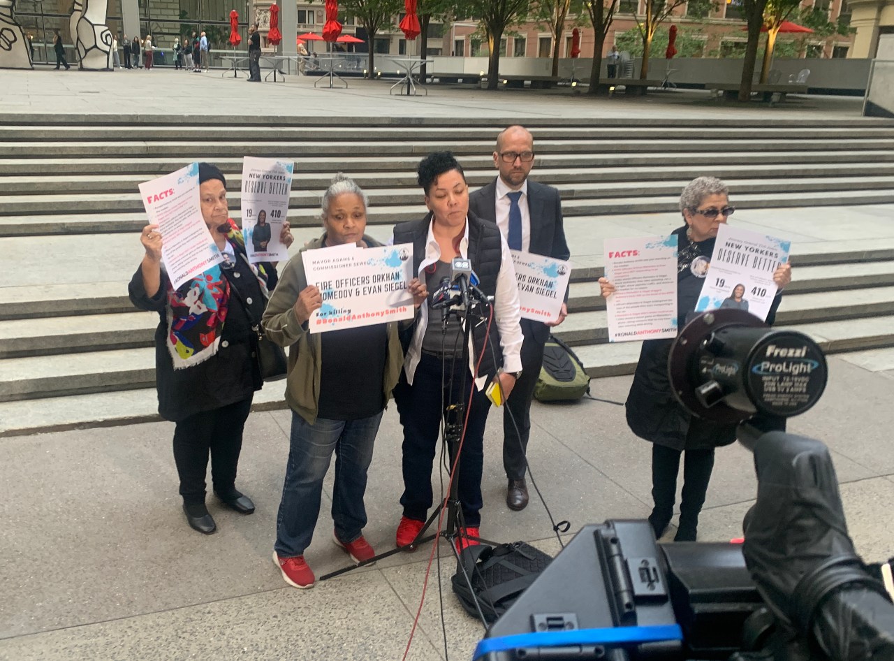 Julie Smith was flanked by supporters.