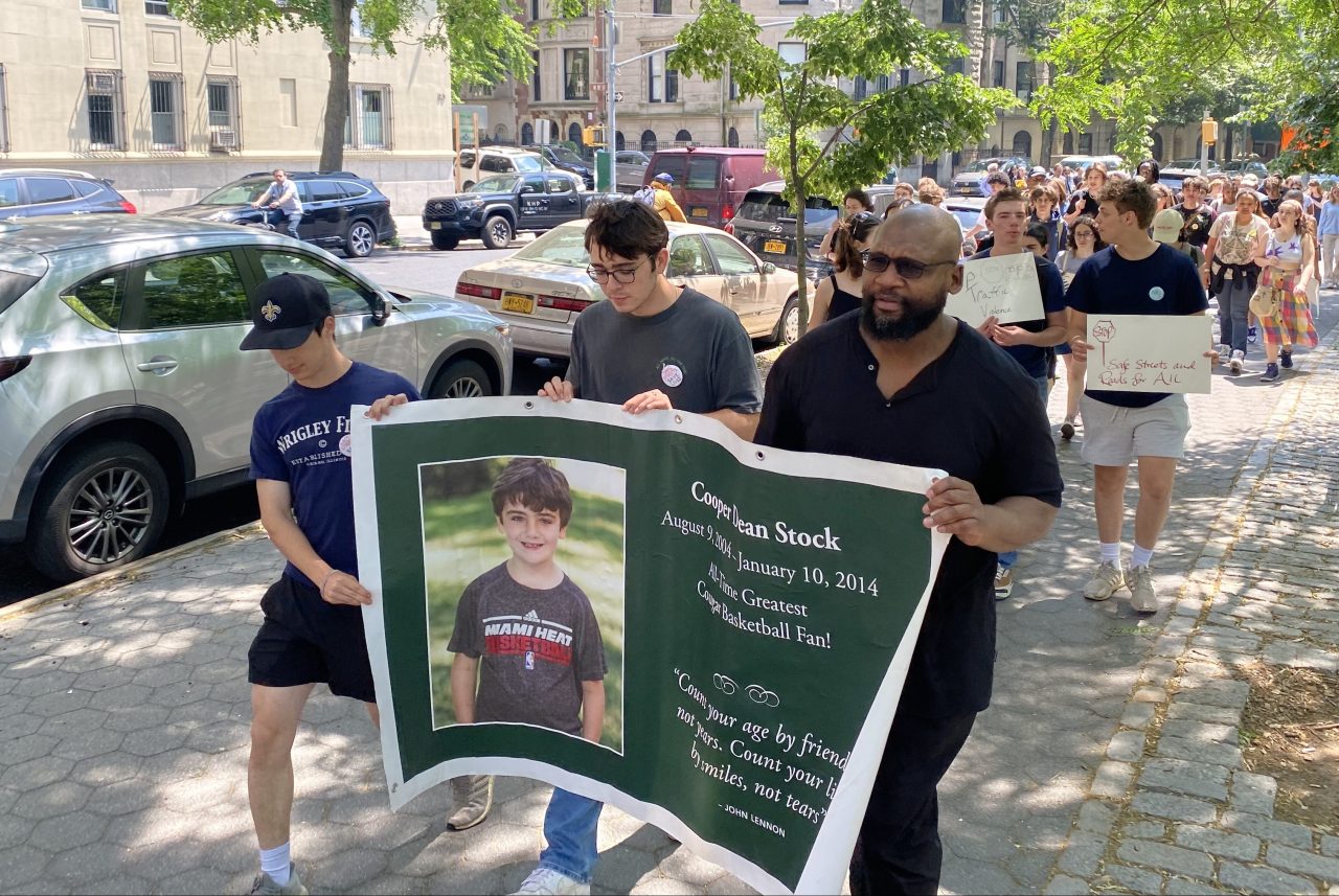 Friends and classmates march up Riverside Drive, which they have done every year since Cooper Stock was killed by a cabbie in 2014. Photo: Kevin Duggan