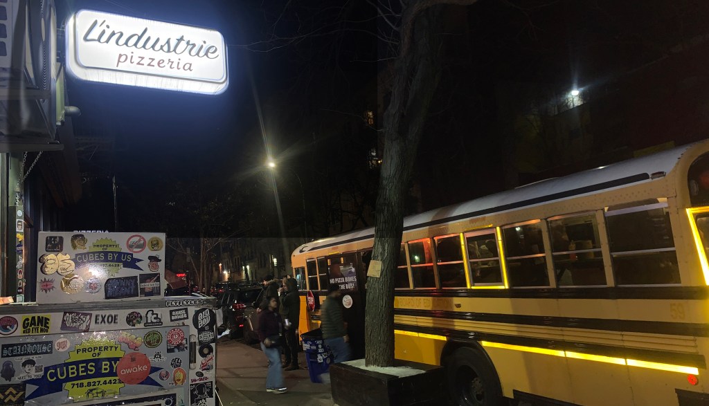 Pizzeria Deploys School Bus to Serve Customers During Winter Curbside Dining Ban