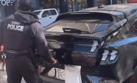 Garbage Cops Parked Cars in Bus Lane With Covered Plates